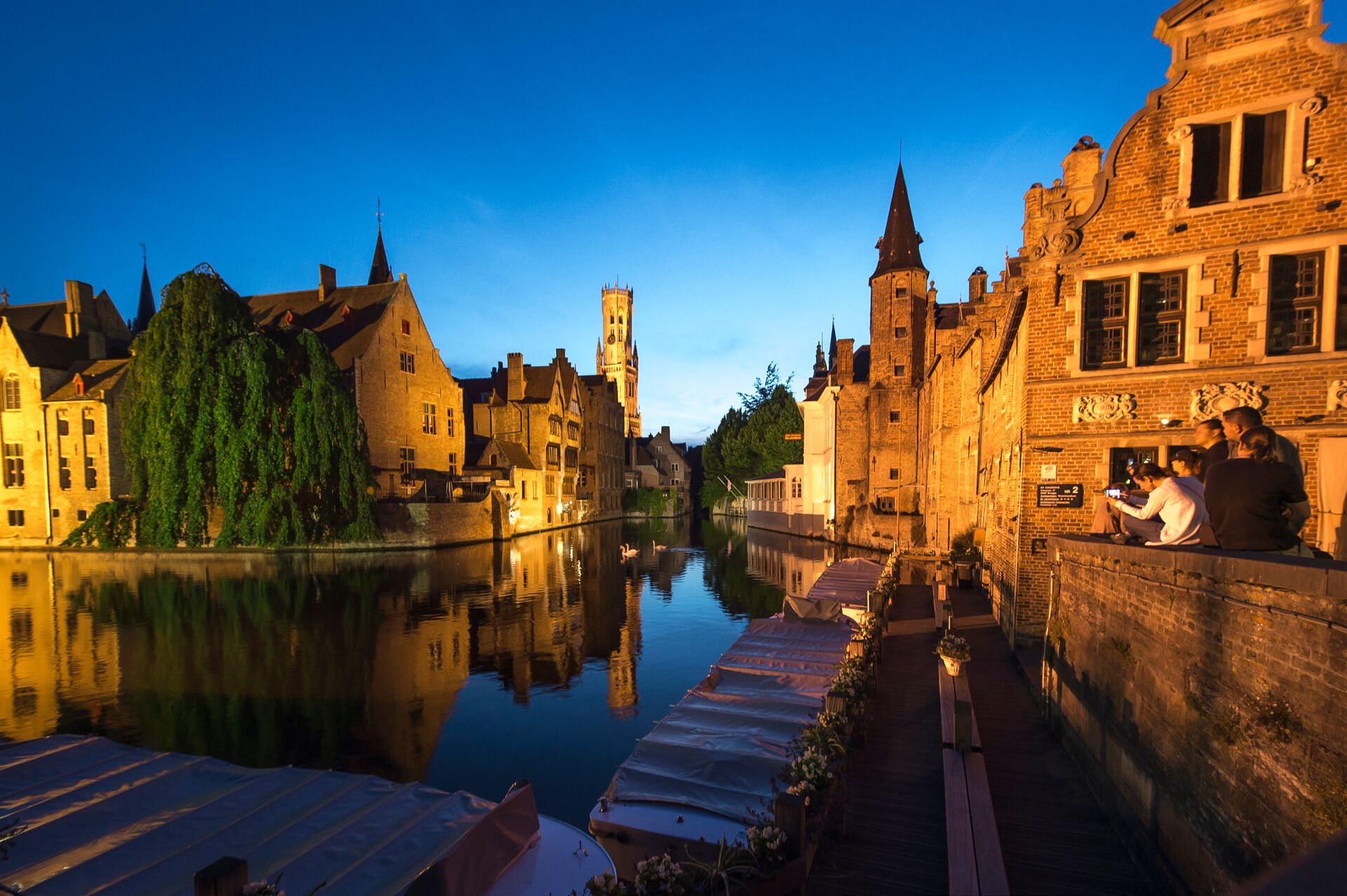 Rozenhoedkaai by evening - Walking through Bruges is like stepping into a medieval fairy tale. Children like fairy tales, no doubt they will like Bruges. A day in Bruges - evening