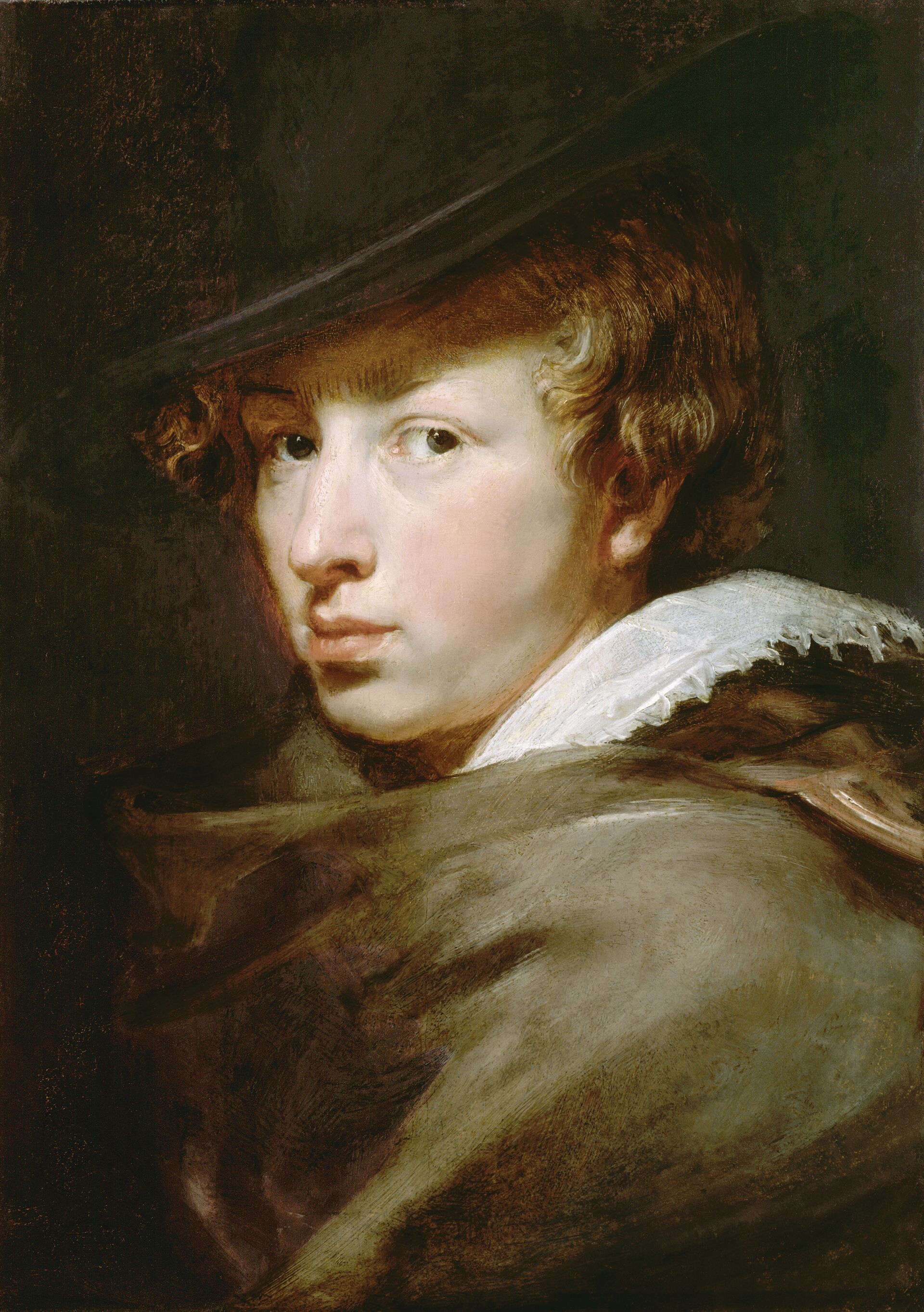 Zelfportret (1616-1617) – Anthony van Dyck Portret van een jonge persoon met golvend haar, met een donkere hoed en mantel. De persoon kijkt over de schouder met een nadenkende blik.