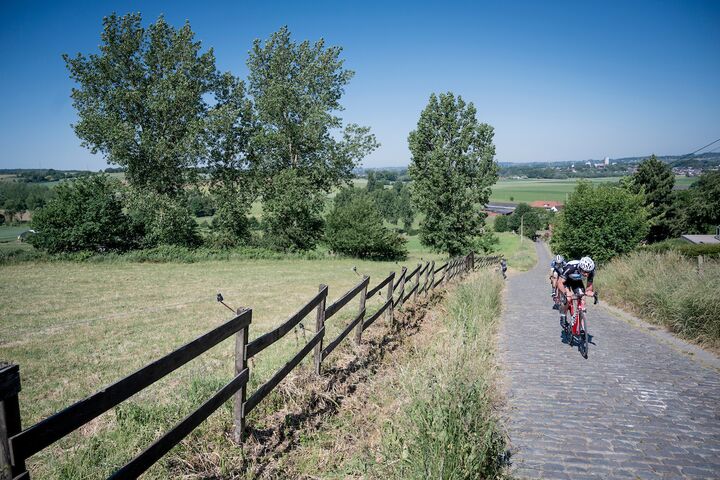Cyclists on the Paterberg Cyclists riding up the Paterberg in Flanders