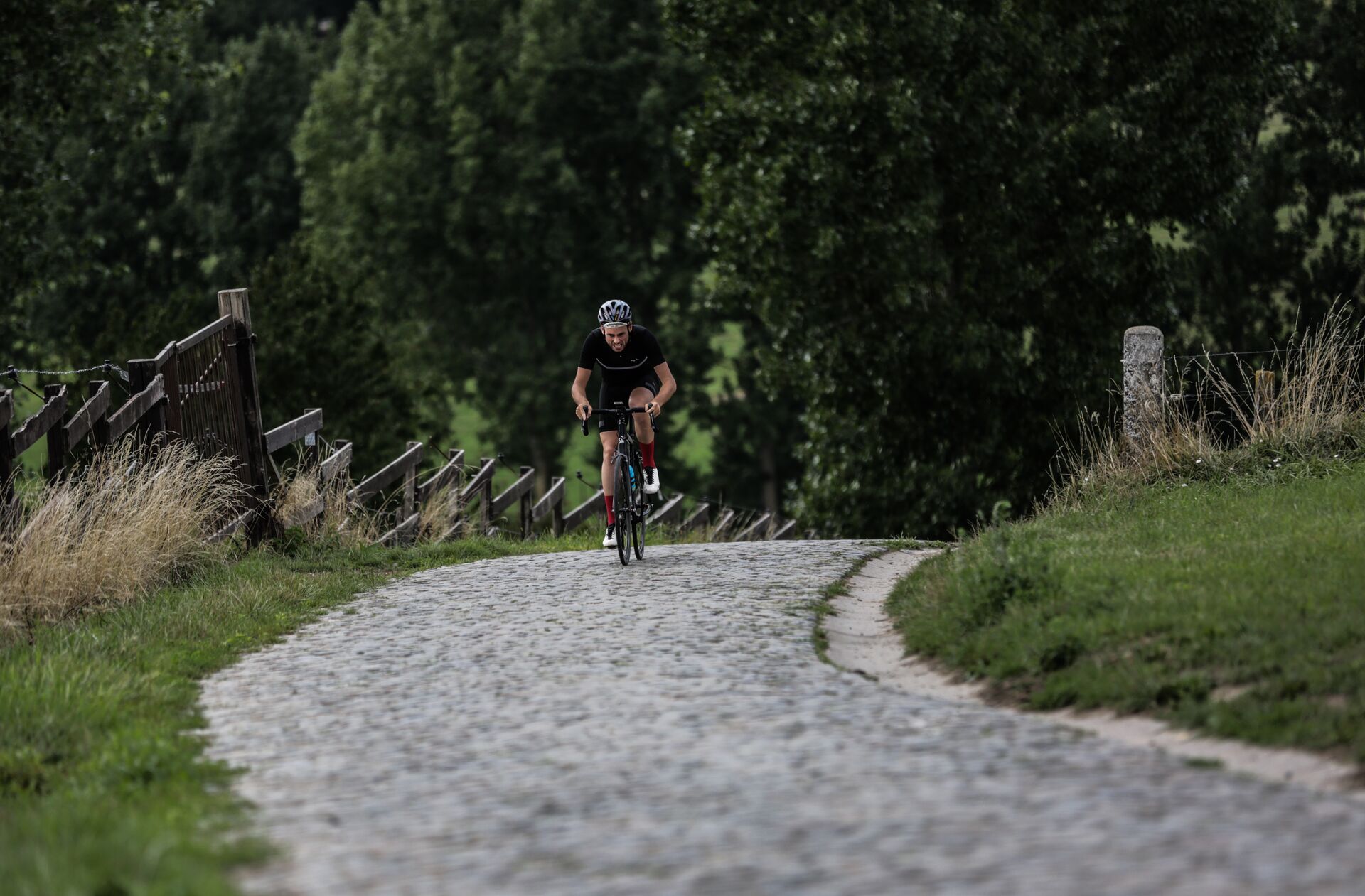 Cyclist riding up the Paterberg in Flanders